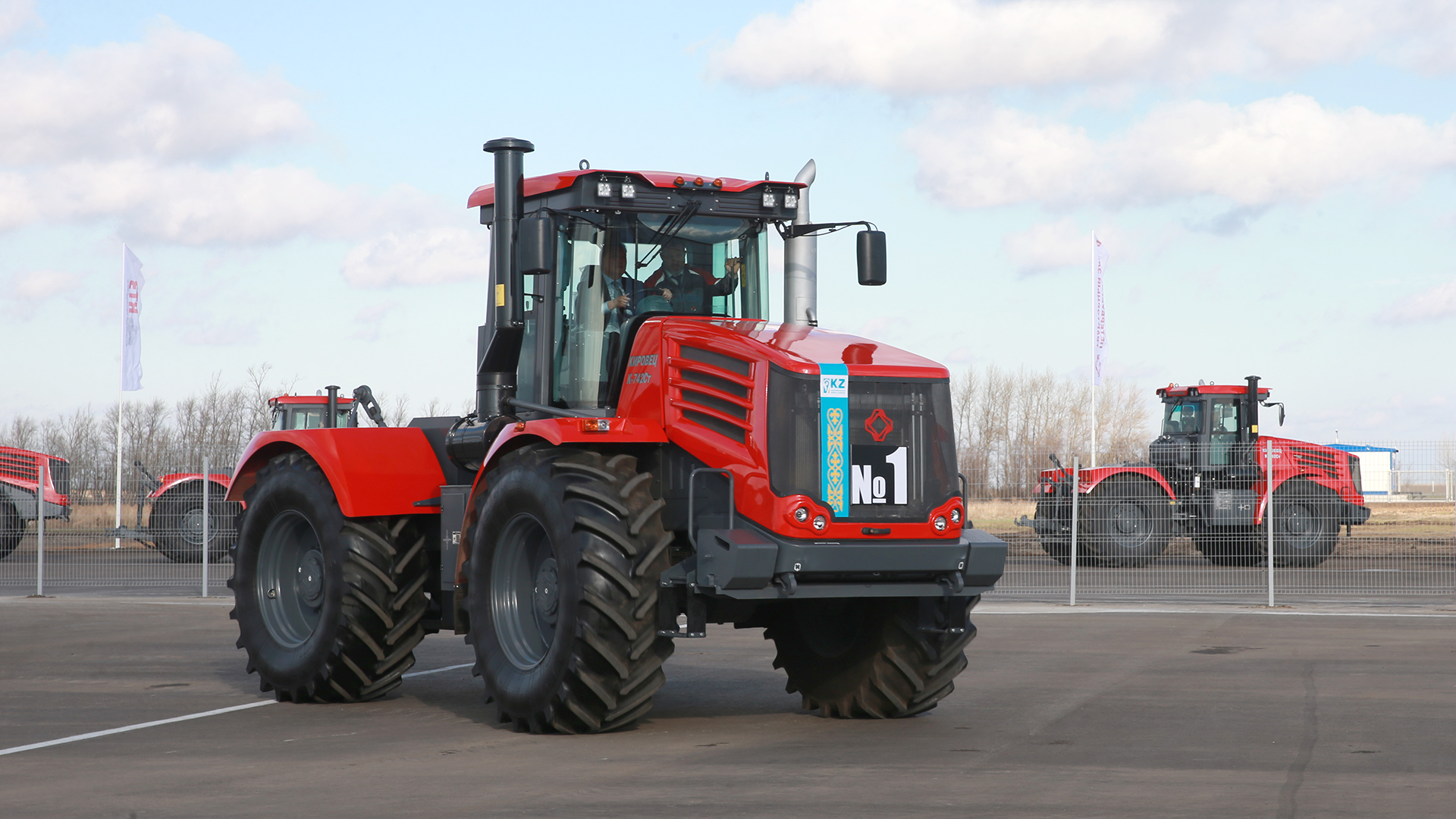 Askar Mamin tests first Kirovets tractor manufactured in Kazakhstan