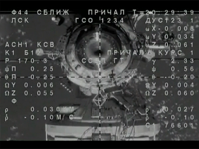 MCC. Soyuz MS-11 spacecraft docks to ISS