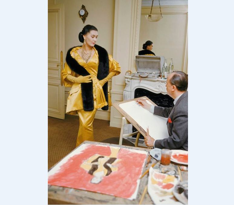 As LIFE magazine's star fashion photographer Mark Shaw shot incredible moments inside the legendary house of Dior throughout the 1950s and '60s. Captured here inside the Dior flagship in 1954 is star model Alla, decked out in Dior’s evening finery called Artamène. She is being sketched by Carl Erickson for American Vogue, best known as Eric.