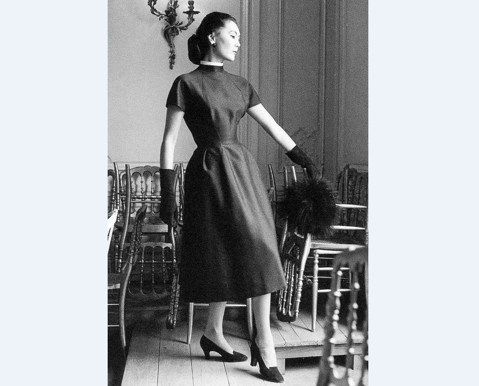 Alla in Dior's dress called "Croque-mitaine" Autumn/Winter Collection Vivante line, photo by Mark Shaw in the salon of Maison Dior, 1953