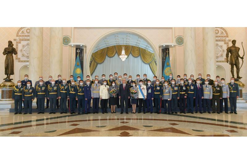 The Head of State presents high orders and medals to military personnel, law enforcement officers